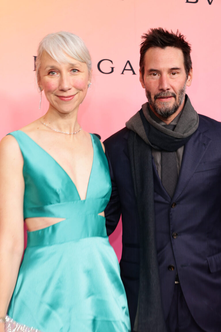 Keanu Reeves’ girlfriend, 54, faces mixed reactions after posing in teal cut-out dress on red carpet